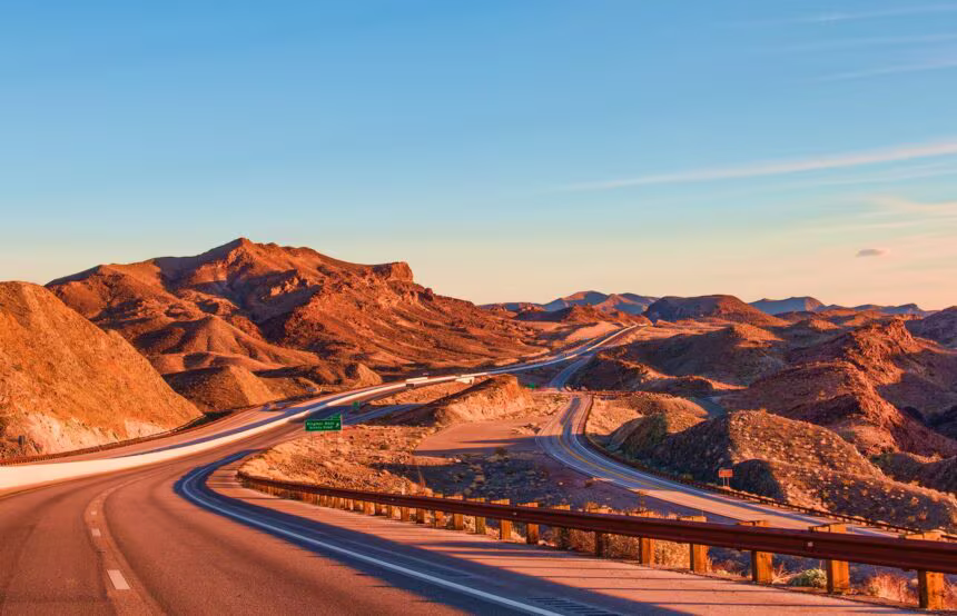 landscape photography of rock formation near highway
