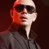 Pitbull en Australia en el 2012. Fuente: flickr. Autor: Pitbull, Dove Cameron