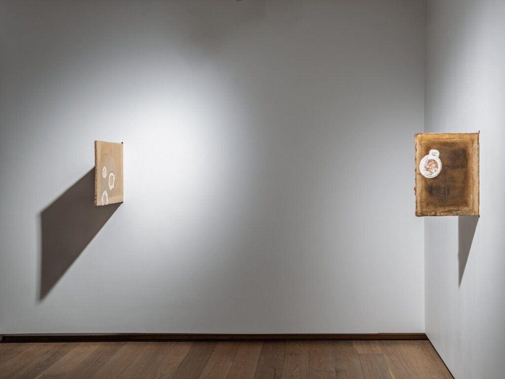 Goldin+Senneby, Swallowimage (verso man in cave with skull, 19th century), 2025 and Swallowimage (verso man in ecstasy with skull, 17th century), 2025. Isaria sinclairii and oil on canvas, dimensions variable. Photo: Jean-Baptiste Béranger  