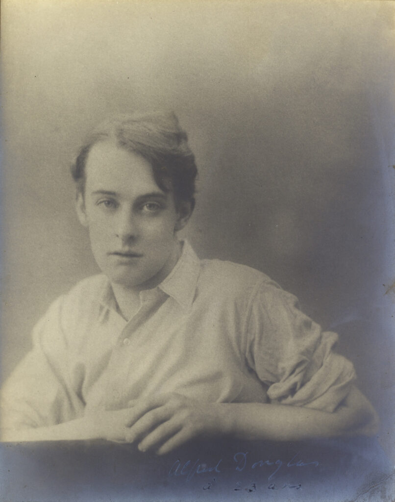 DOUGLAS (LORD ALFRED) Portrait photograph of Lord Alfred Douglas, by Cameron Studio, SIGNED BY THE SITTER ("Alfred Douglas", and in a different hand "à 23 ans") on the image, [c.1893] Estimates_1,000 - 2,000