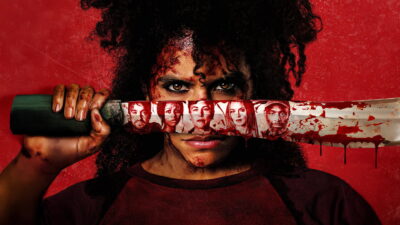 Still from They Will Kill You, Kirill Sokolov's Manhattan high-rise cult horror, with Zazie Beetz as the housekeeper Asia Reaves walking into a building where tenants have been disappearing for years