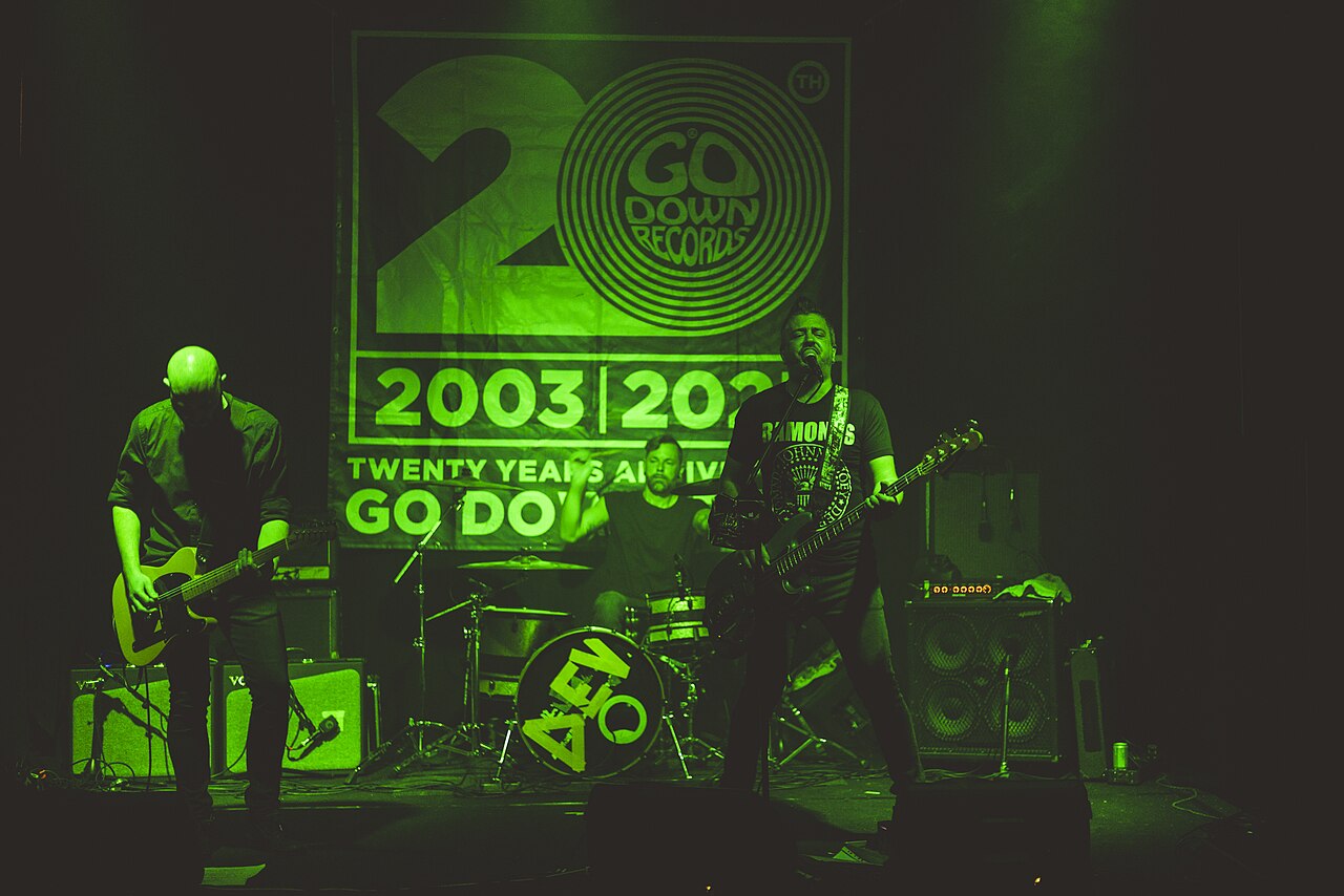 Underdogs performing live on stage in 2023