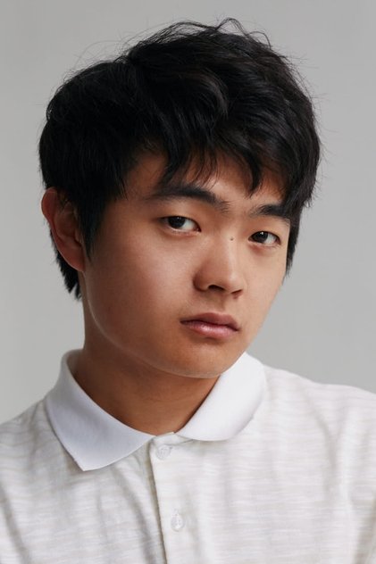 Ben Wang dans le rôle de Hank Olson #46