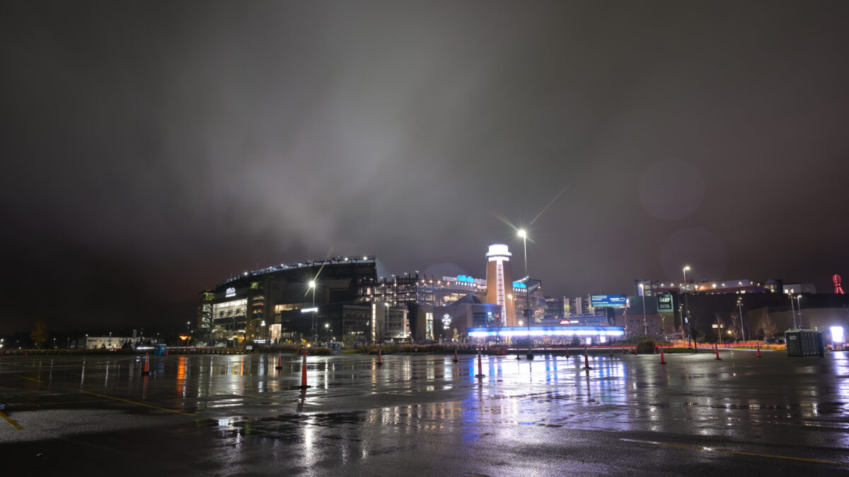 Gillette Stadium illuminated at night in the rain, Foxborough Massachusetts