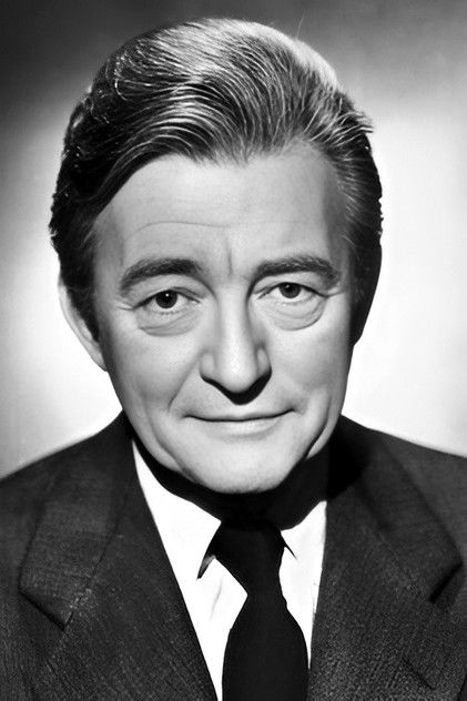 Claude Rains dans le rôle de Captain Louis Renault