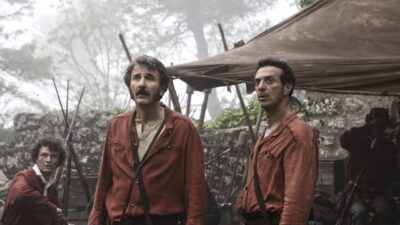 Salvatore Ficarra and Valentino Picone in Garibaldine red shirts in Roberto Andò's The Illusion (L'abbaglio).