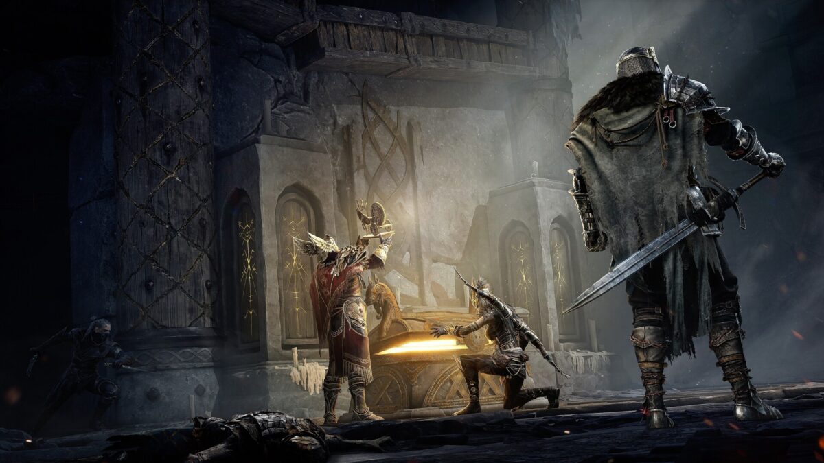 A three-player squad loots a glowing chest inside a dark dungeon in Mistfall Hunter