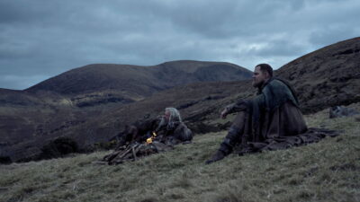 A backdrop still from Michael Sarnoski's The Death of Robin Hood, with Hugh Jackman as a wounded Robin Hood.