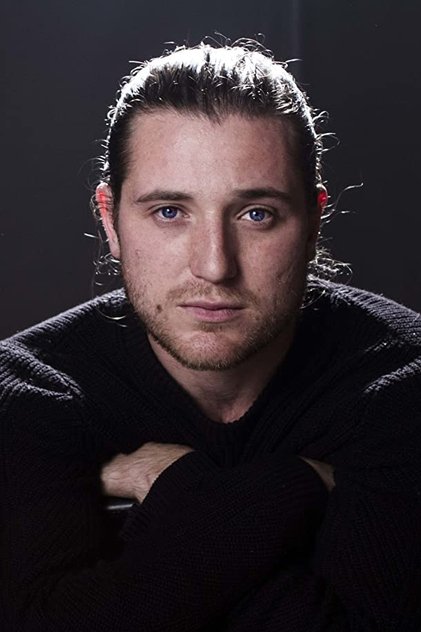 Trevor Morgan como Tommy Tammisimo