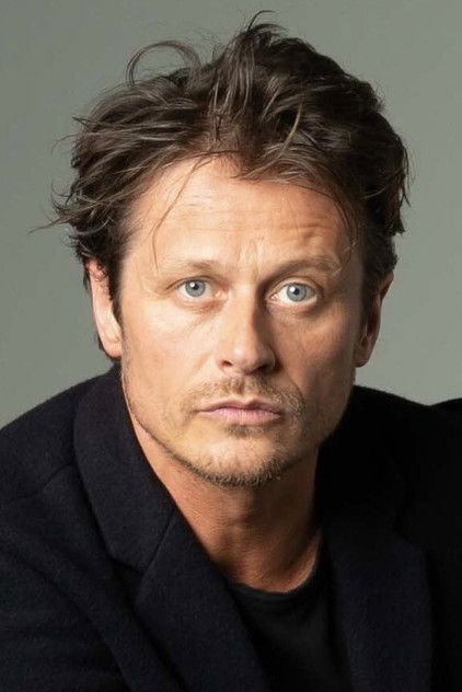 Roman Knižka as Roman Bergmann
