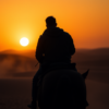 Solitary rider on horseback silhouetted against desert horizon at dusk, horse turned sideways