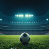 A football on the pitch of a floodlit World Cup stadium at night