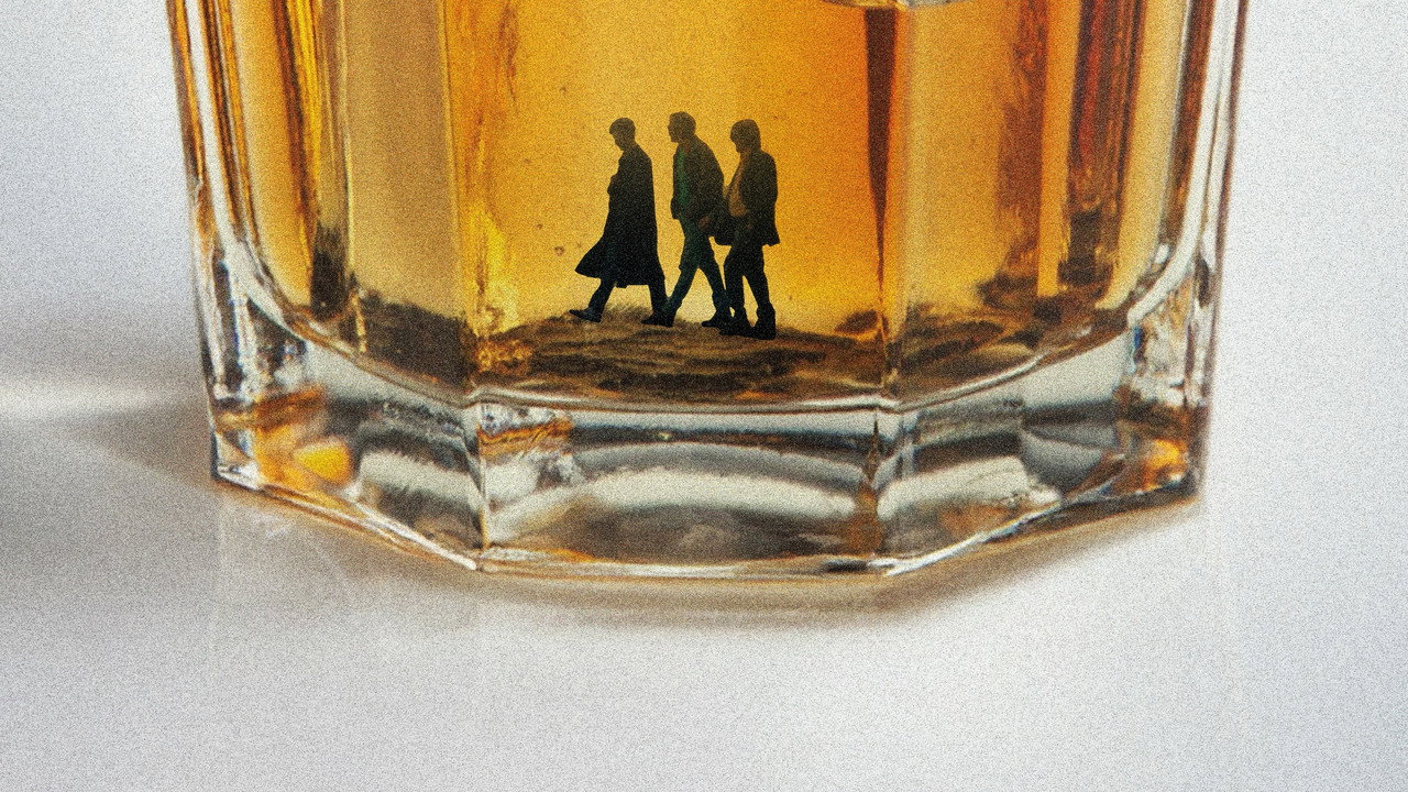 The three leads of Francesco Sossai's The Last One for the Road walk in silhouette inside a beer glass in the film's key art.