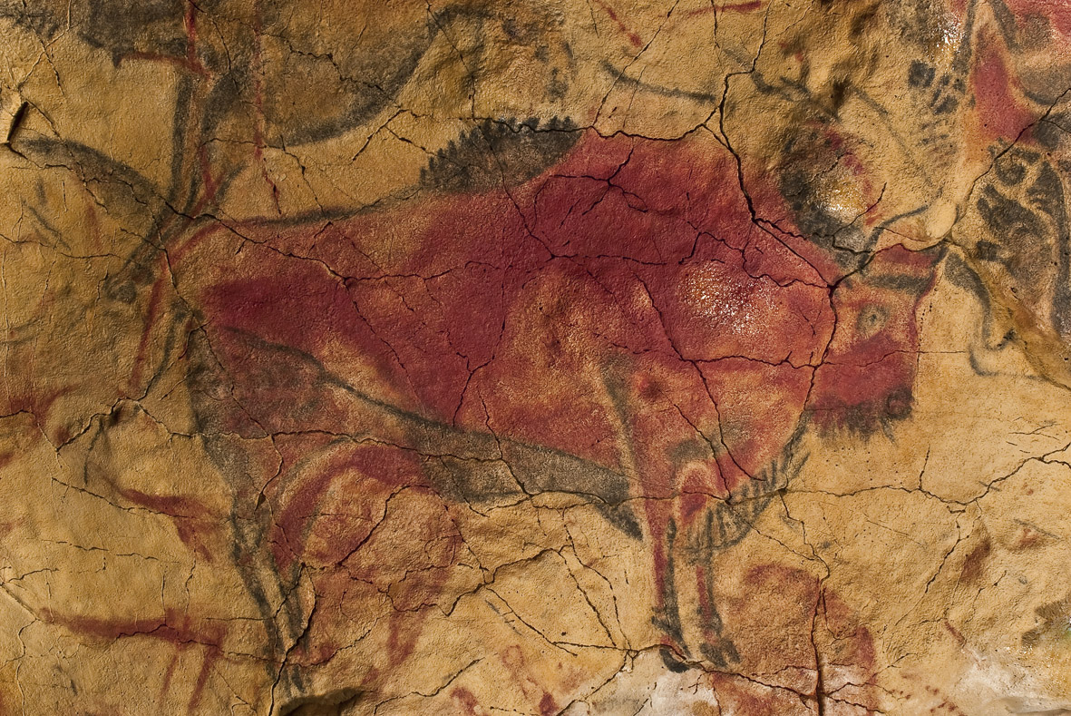 Close-up of a red-and-black bison painted on the ceiling of Altamira Cave, northern Spain, approximately 14,000 years old