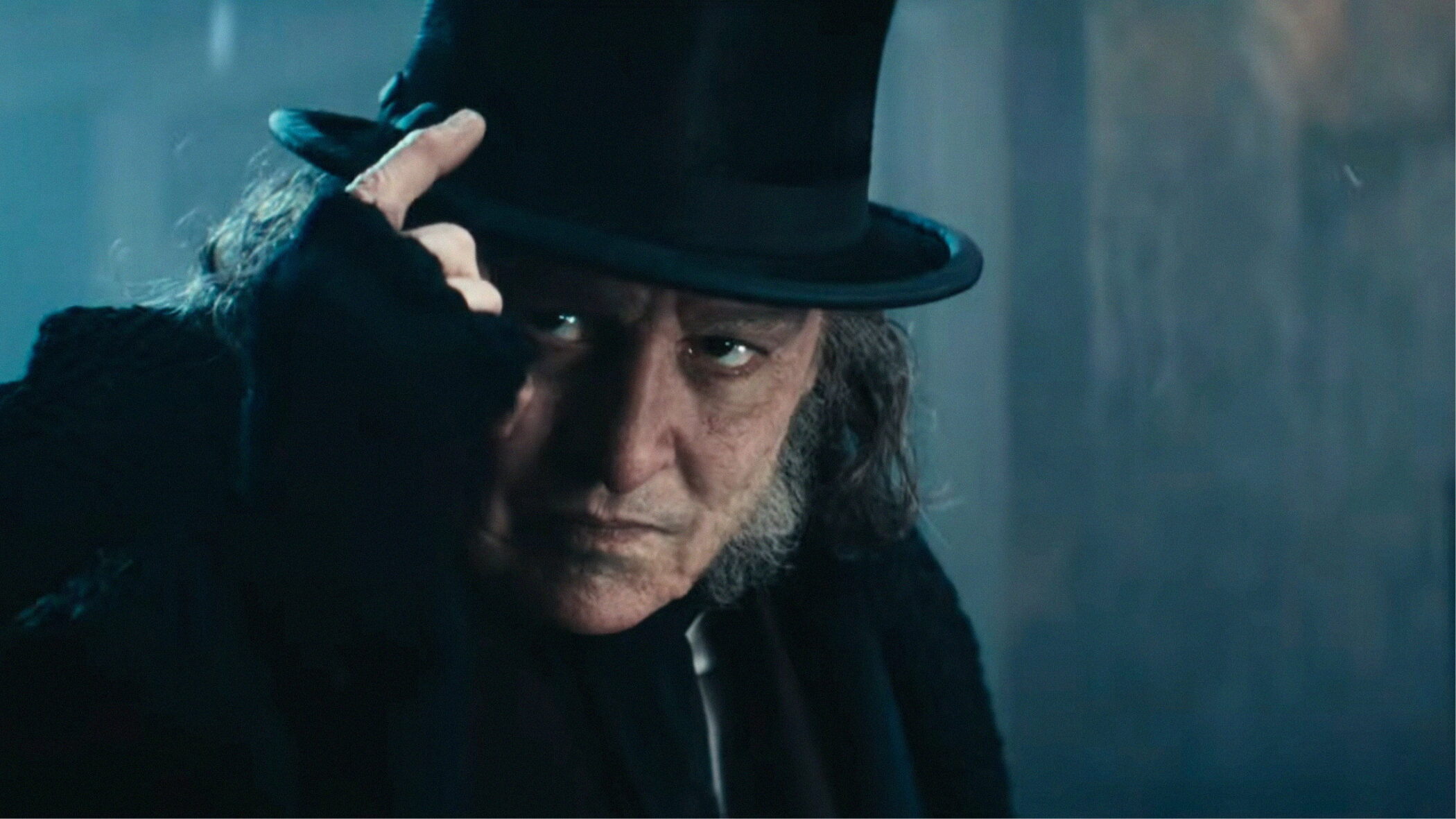 Johnny Depp as Ebenezer Scrooge