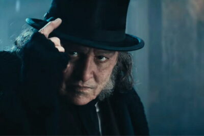 Johnny Depp as Ebenezer Scrooge