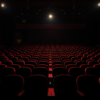 Empty awards theater with vacant velvet seats under a single theatrical spotlight