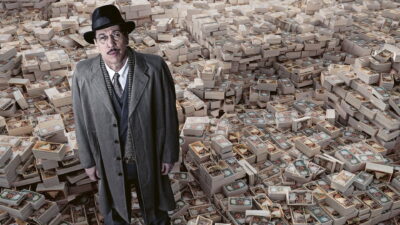 A still from Jean-Paul Salomé's The Money Maker, with Reda Kateb as the master counterfeiter Bojarski.