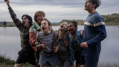 The teenage ensemble of George Jaques's film Sunny Dancer at a lakeside summer camp.