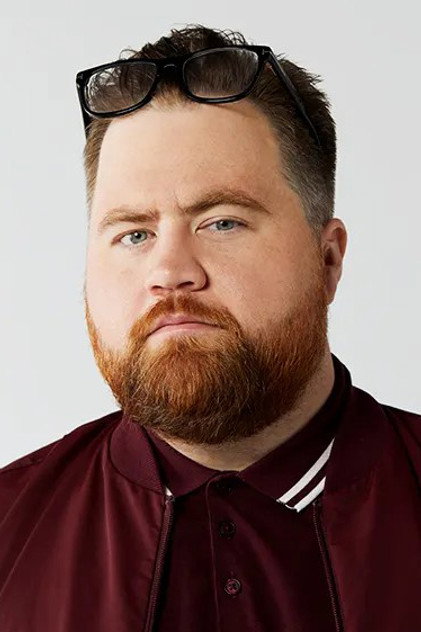 Paul Walter Hauser como Simon