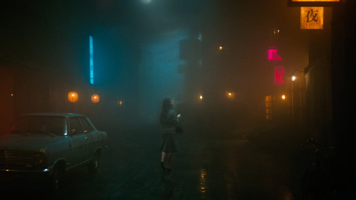 A neon-lit street shrouded in mist in the Nicolas Winding Refn film Her Private Hell, 2026