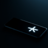 Editorial conceptual image: a sleek smartphone on a dark surface, abstract asterisk glowing on its screen