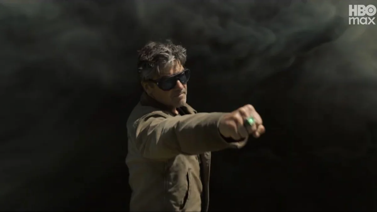 Kyle Chandler as Hal Jordan holding up his Green Lantern ring in Lanterns