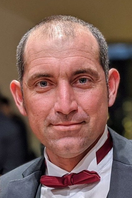 David Scicluna como Father