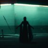 Official video still from Phoebe Bridgers Lost Boys — Renaissance faire scene