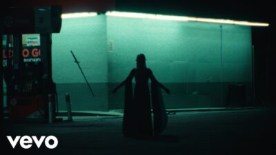Official video still from Phoebe Bridgers Lost Boys — Renaissance faire scene