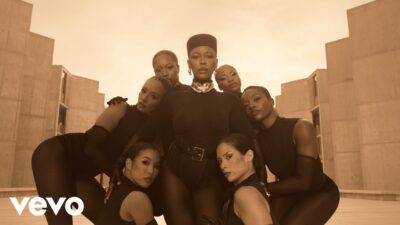 Victoria Monét in the “Reach Out” official video