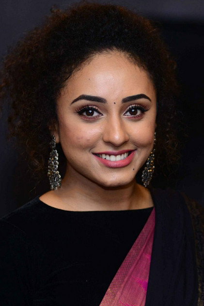 Pearle Maaney como Sheeja Thomas