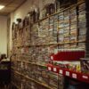 Vinyl records and music playback equipment representing the physical catalog of iconic film scores