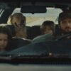 John Magaro drives two children west in Omaha, and the film keeps the reason offscreen