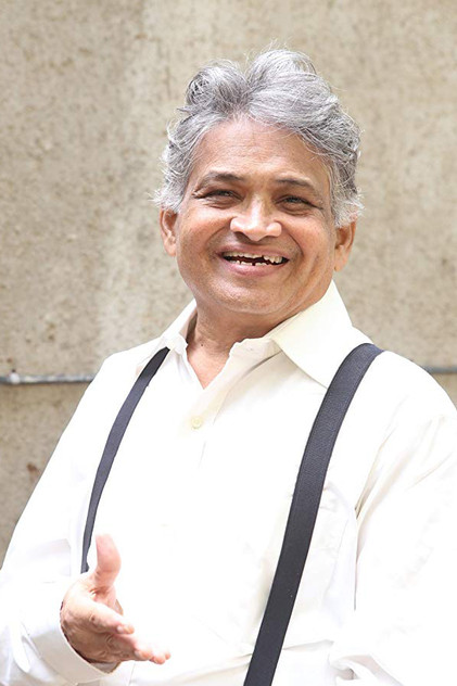 Ajit Kelkar como Raman Kaka