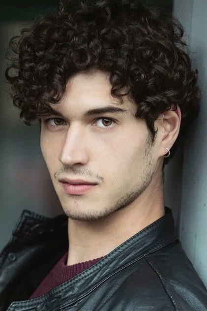 Giancarlo Commare as Ernesto