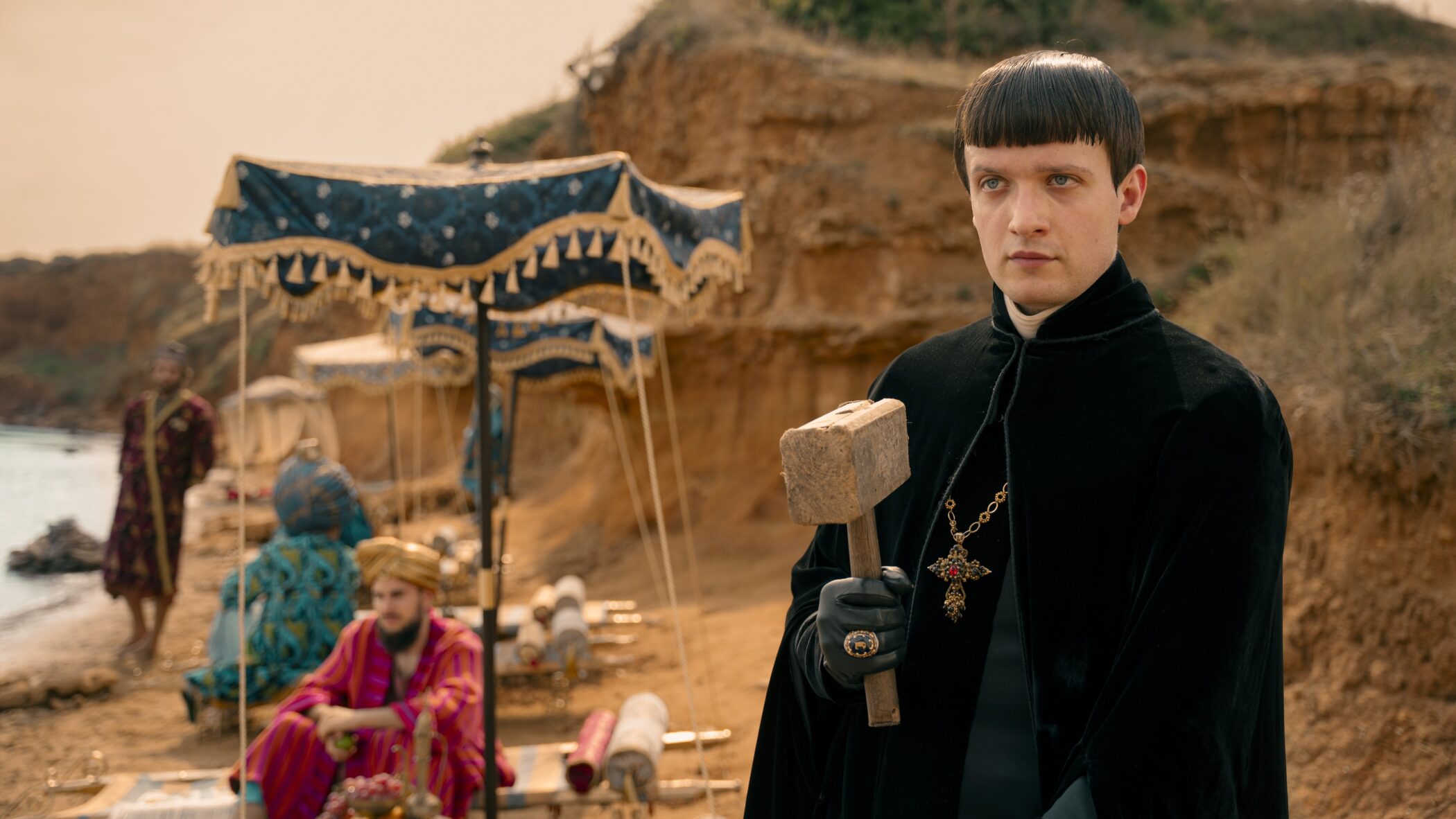 A priest wielding a mallet in 1670 season 3