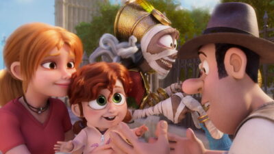 Tad, Sara and the bandaged mummy greet a toddler on a London street in Enrique Gato's animated Tad and the Magic Lamp.