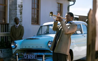 タボ・ラメツィがヒュー・マセケラに扮する初画像──コンドン監督『The Road Home』は「グレイスランド」騒動を亡命者の視点で描く