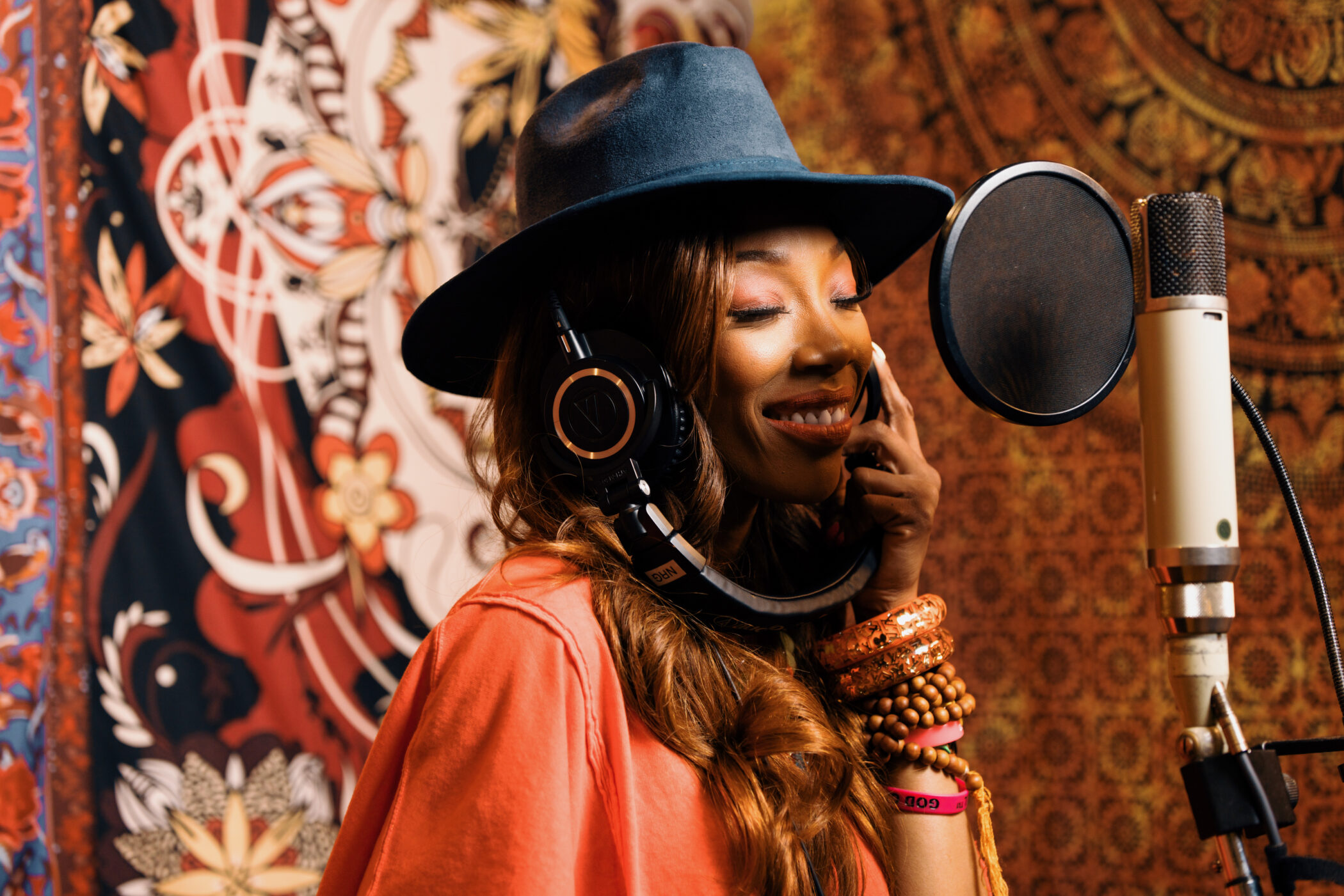 Brandy recording the new A Different World theme song