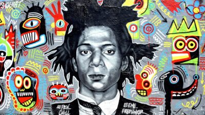 Mural portrait of Jean-Michel Basquiat by Eme Freethinker and Pen Chill in Mauerpark, Berlin