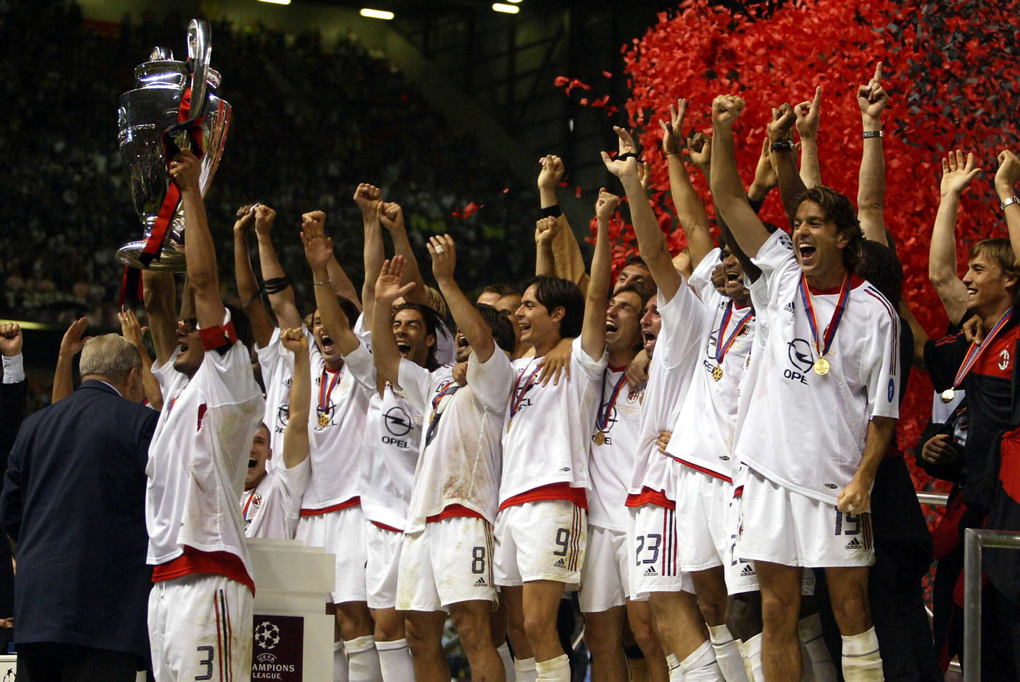 Players lift the UEFA Champions League trophy after winning the final.