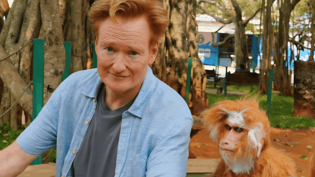 Conan OBrien alongside a monkey during his visit to India in Season 3 of Conan OBrien Must Go