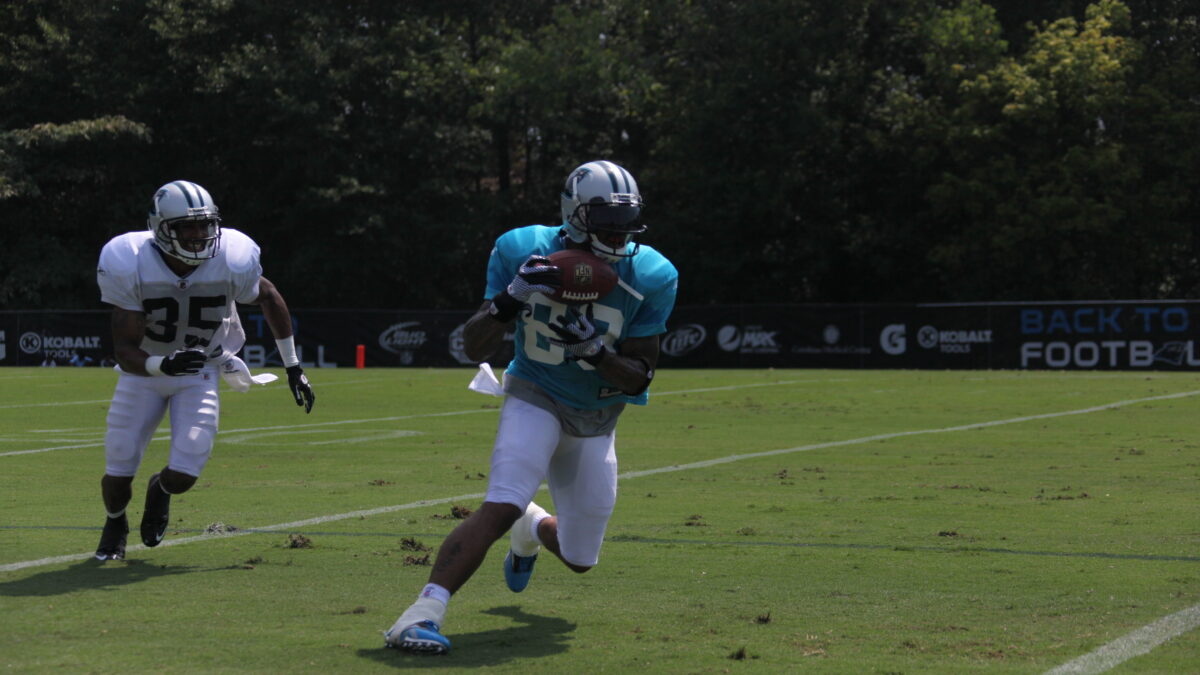 NFL players running drills at training camp