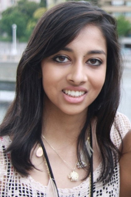 Sophie Patel como Amrita Singh
