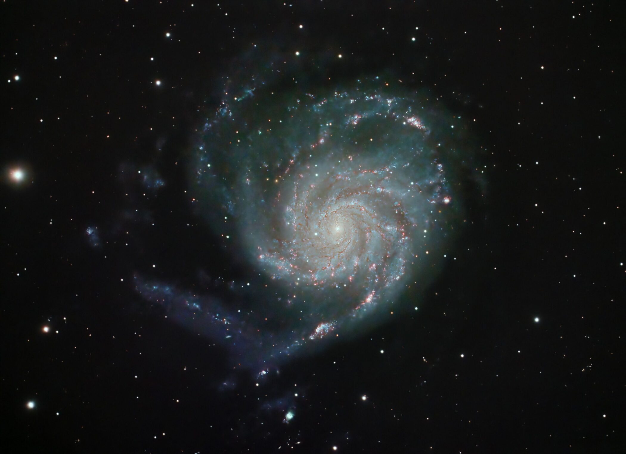Spiral galaxy stellar populations photographed against a star field — related to James Webb Space Telescope galaxy mass research