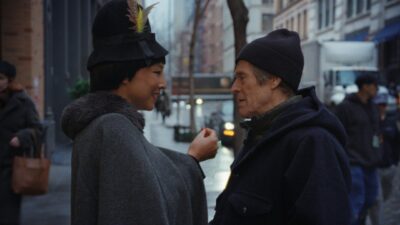Greta Lee and Willem Dafoe on a New York street in Kent Jones's Late Fame
