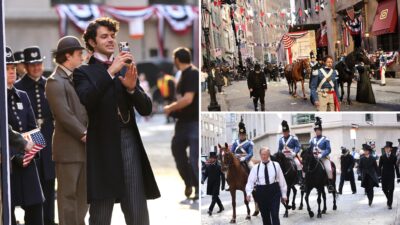 Behind-the-scenes production photo from The Gilded Age Season 4 filming the parade sequence in New York City