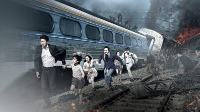 Passengers fleeing along the tracks beside a derailed train in Train to Busan