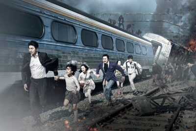Passengers fleeing along the tracks beside a derailed train in Train to Busan